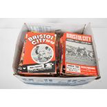 A box of Bristol City football programmes