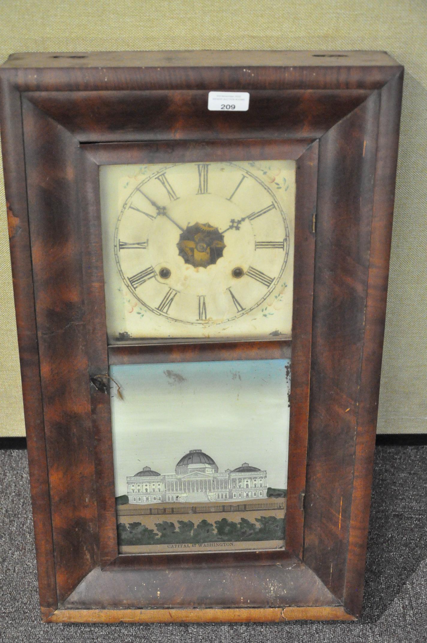 A 19th century mahogany American wall clock with a verre eglomise door. Measures; 65cm x 38cm. - Image 2 of 2
