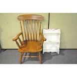 A set of wall shelving and a farmhouse kitchen chair