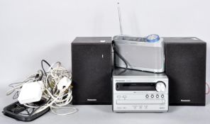 A Panasonic CD player, two speakers,