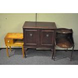 A bedside table in mahogany,