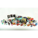 A group of toy cars and other items