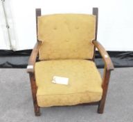 An Art Deco 1930s oak child's chair fitted with a deep cushion