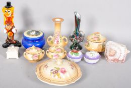 A collection of assorted ceramic items to include; lidded pots, part vanity set,
