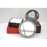 Two vanity mirrors together with display boxes for Cartier,