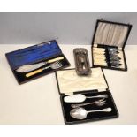 A box of silver plated knives and other items