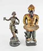 A Blackamoor figure and a lady figure