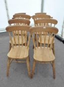 A set of eight pine kitchen chairs