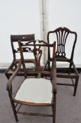 A camel back chair and two others
