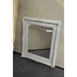 A white painted mirror