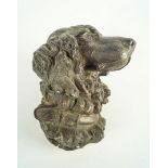 A cast metal dogs head