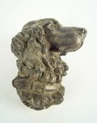 A cast metal dogs head