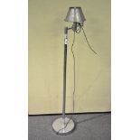 A chrome standard lamp