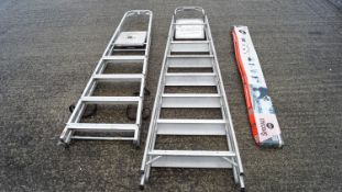 Two step ladders and storage bars