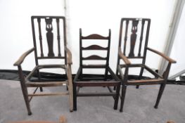 Two Arts and Crafts oak chairs and another