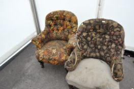 Two upholstered tub chairs with floral fabric