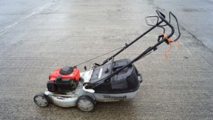 A petrol lawn mower with grass box