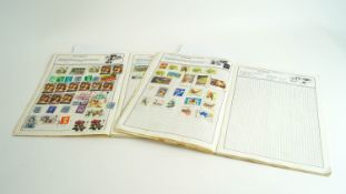 Two stamp books containing stamps from around the world