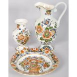 A set of painted Delft Polychrome Holland china to include; plate, jug and vase.