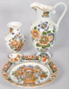 A set of painted Delft Polychrome Holland china to include; plate, jug and vase.