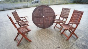 Four teak folding chairs and a garden table (5)