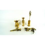 A collection of assorted brass ware to include a model of a horse, brush jug etc