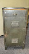 A metal locking cabinet/safe