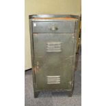 A metal locking cabinet/safe