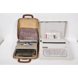 An electric typewriter and another