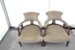 A pair of upholstered chairs