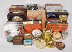 Two boxes of assorted tins and plastic matchboxes