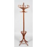 A stained turned wood coat stand, in the Victorian style,