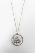 A Jensen pewter pendant with chain. Stamped 'Jorgen Jensen Denmark' Pewter 386 21.