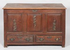An oak and cooper mounted mule chest, with hinged plank top,