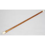 An early 20th century malacca sword stick with 72cm steel blade,