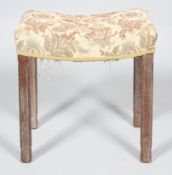 A Coronation stool, of rectangular section with concave seat re upholstered in floral fabric,