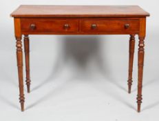An early 19th century mahogany side table, with two frieze drawers,