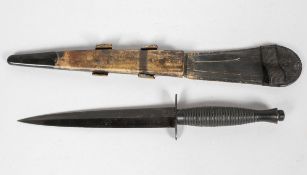 A reproduction FS fighting knife, in scabbard,