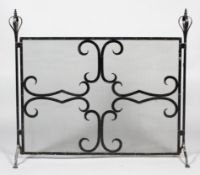 A large painted steel wrought iron fire screen, with globe coronet style finials,