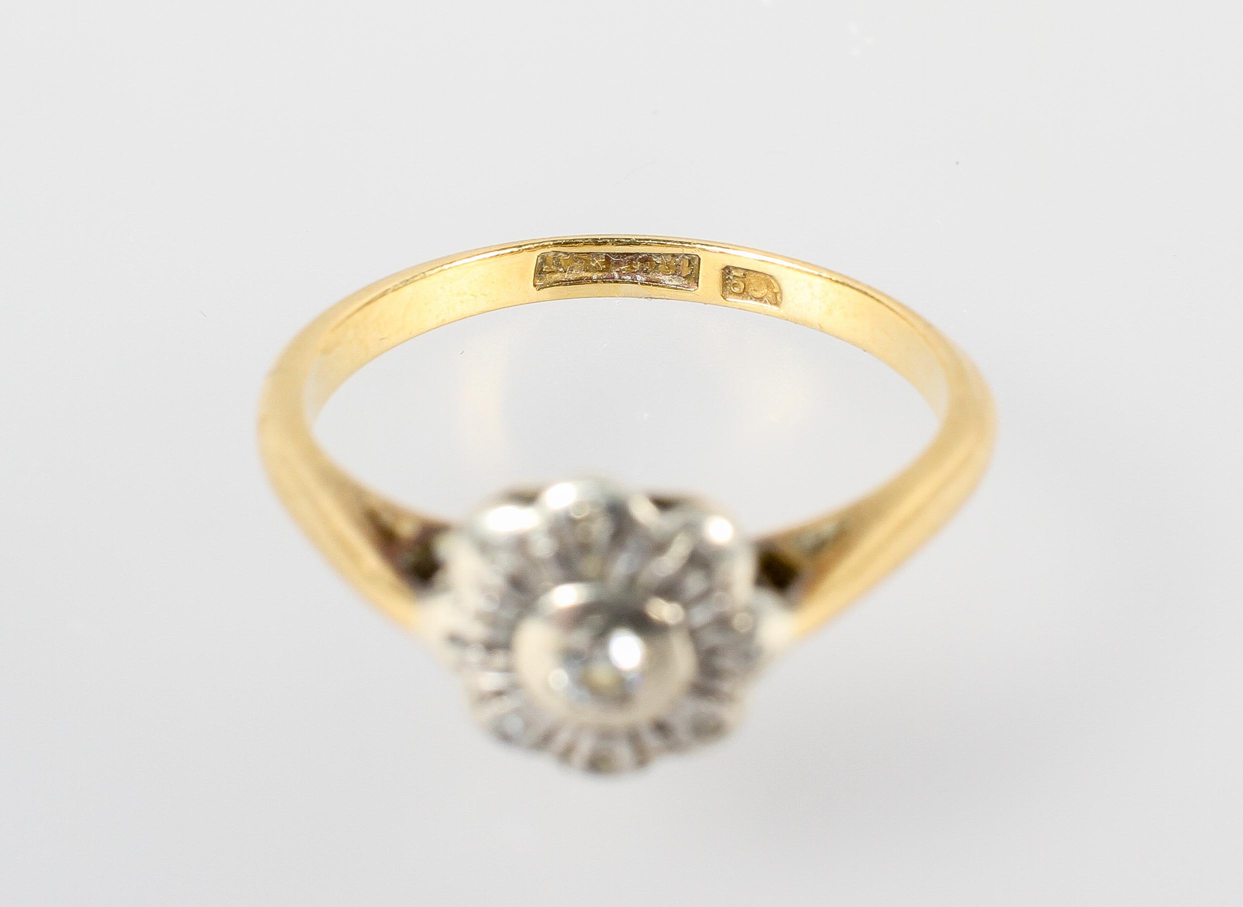 A yellow and white metal illusion set single stone diamond ring. No hallmark - stamped 18ct Plat. - Image 3 of 3