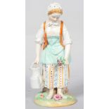 A Dresden porcelain figure of a lady gardener, late 19th century, blue monogram and script mark,