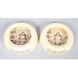 A pair of Ashtead Potteries Guinness ashtrays, circa 1920, printed marks,