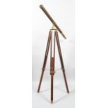 A Victorian brass telescope on stand, with lens, 1 1/2" (4cm) diameter, the telescope 100.