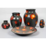 A Poole pottery 'Galaxy' design ovoid vase with outswept neck, 25cm high, another similar vase,