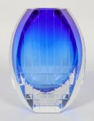 A Baccarat Neptune blue and clear glass vase, of facetted oval form with geometric cut decoration,