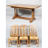 A Topknot English Oak 'French Monks Refectory Table' and six oak and rush dining chairs, 2002.