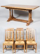 A Topknot English Oak 'French Monks Refectory Table' and six oak and rush dining chairs, 2002.