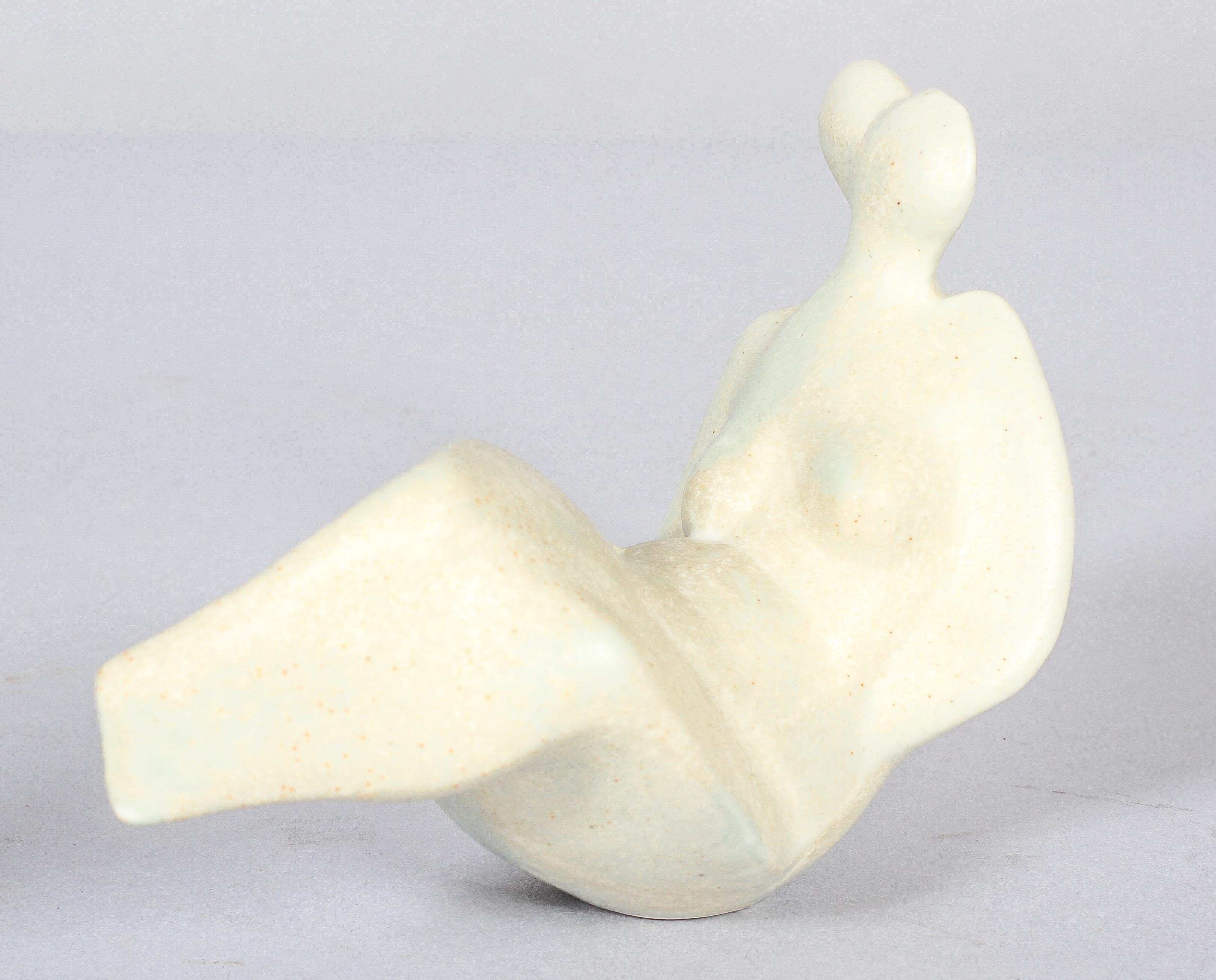 A Peter Wright (1919-2003) Studio porcelain figure of a reclining female nude,