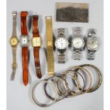 A collection of items to include: Seven wristwatches of variable designs (Zenith, Tissot, Rotary,