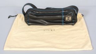 A Loewe, Madrid, black leather handbag with blue piping with cover bag,